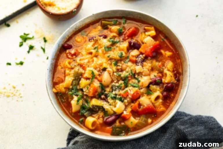 Grandma's Secret Garden Minestrone 3 An overhead view of homemade Minestrone soup, highlighting the chunky vegetables and comforting texture.