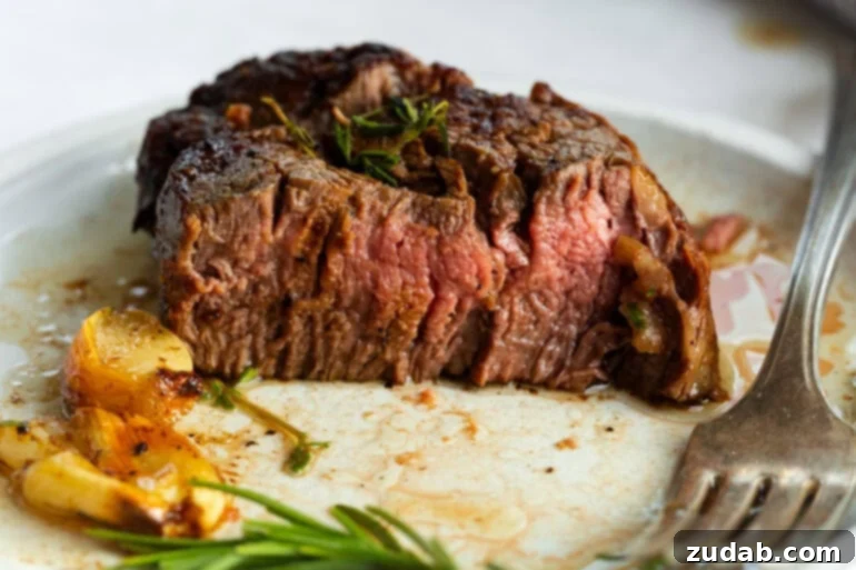 The Ultimate Guide to Filet Mignon: Restaurant-Quality Results at Home 5 Juicy filet mignon with a perfectly cooked pink center