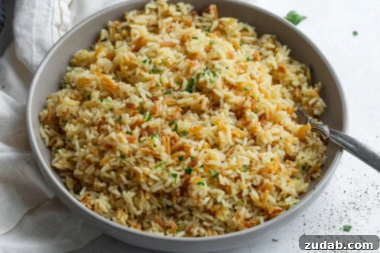 Fluffy & Fragrant Rice Pilaf 2 Simple rice pilaf in a ceramic bowl