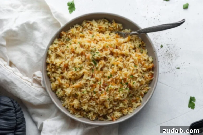 Fluffy & Fragrant Rice Pilaf 3 Overhead shot of buttery rice pilaf