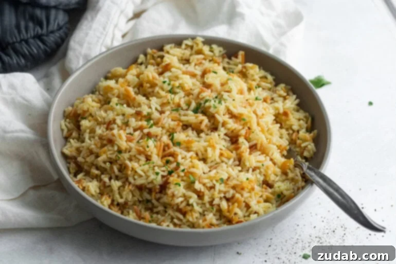 Fluffy & Fragrant Rice Pilaf 4 Fluffy rice pilaf in a grey bowl