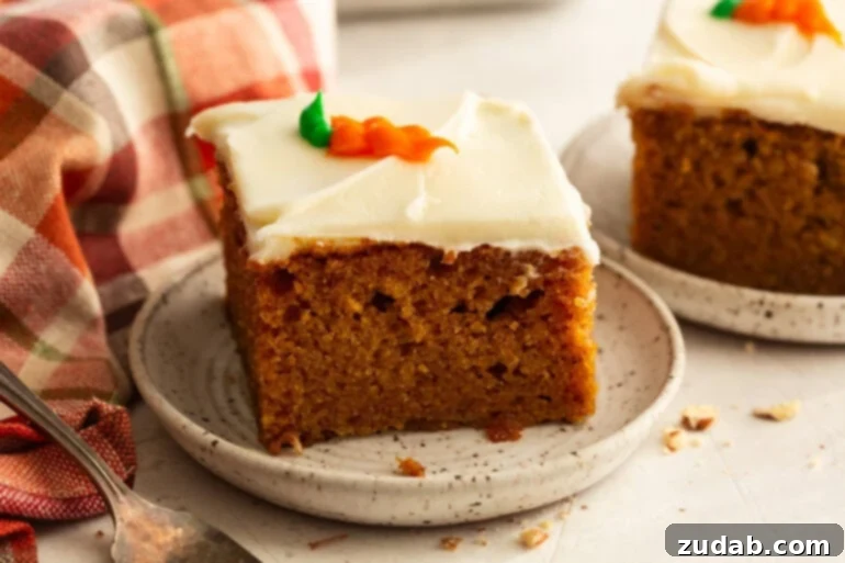 Effortless Carrot Cake: The Baby Food Secret 2 a slice of moist carrot cake with cream cheese frosting