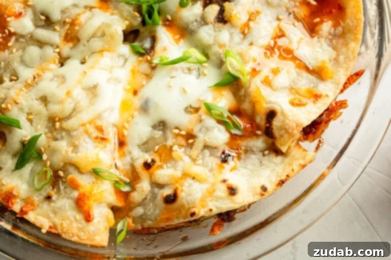 Crispy Korean Beef Pockets Speedy Weeknight Delight 2 a round casserole dish full of crispy tortilla pockets filled with korean ground beef and topped with melted mozzarella cheese