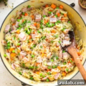 lemon orzo with ham, peas, carrots and parmesan cheese