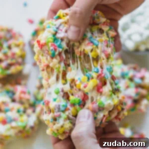 Fruity Pebbles Rice Krispie Treats are colorful, chewy, and full of nostalgic cereal crunch.