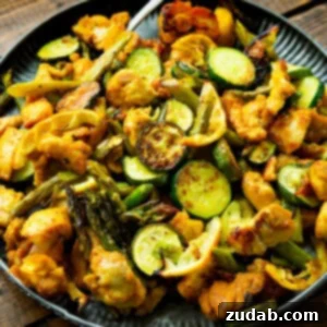 One pan honey turmeric chicken with asparagus and zucchini.