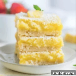 Classic Lemon Bars with a dusting of powdered sugar.