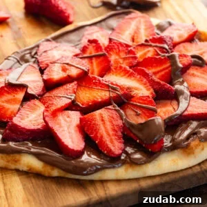 Nutella strawberry dessert pizza